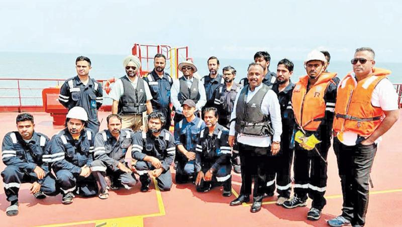 Sri Lankan High Commissioner Kananathan and the Indian High Commissioner to Nigeria with the crew members in the vessel in Nigeria