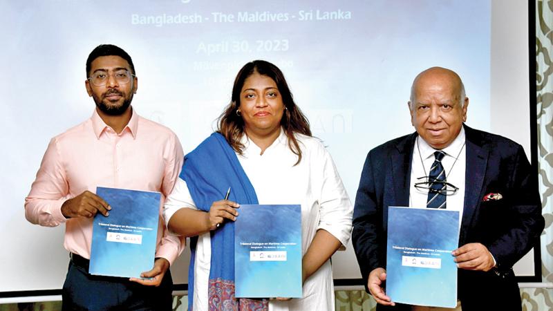 Adviser to Factum Mandana Ismail Abeywickrema, President of BIPSS Major General Muniruzzaman, and Co-Founder of The Baani Centre Thoriq Hamid after signing the trilateral MoU on maritime cooperation