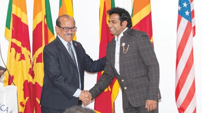 Founder President of the Sri Lanka-America Association of Southern California Jaym Rutnam welcomes the Association’s new president Niroshan Kahawatte