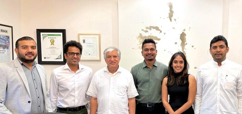 Officials of Moose Clothing Company and Mustafa Center