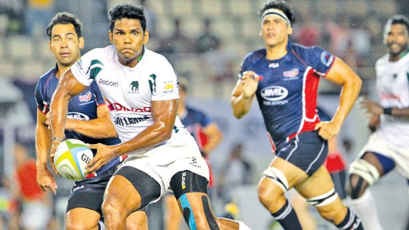 File photo of one of Sri Lanka’s most illustrious players Fazil Marija playing in an international match when rugby players in the island savoured good times on the Asian circuit