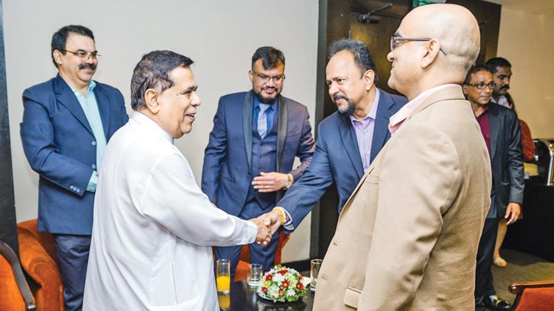 CEO Manaco Marine, Capt. Nalin Peiris welcomes Minister Nimal Siripala de Silva. Looking on (from left) are: Deepak Degodawala of Bernhard Schulte Shipmanagement Crew Services, India, Managing Director, Bernhard Schulte Shipmanagement Crew Service Centre, India, Capt. Sankalp Shukla, and First Secretary, E&C, High Commision of India, Vivek Sharma. Pic: Sudath Malaweera