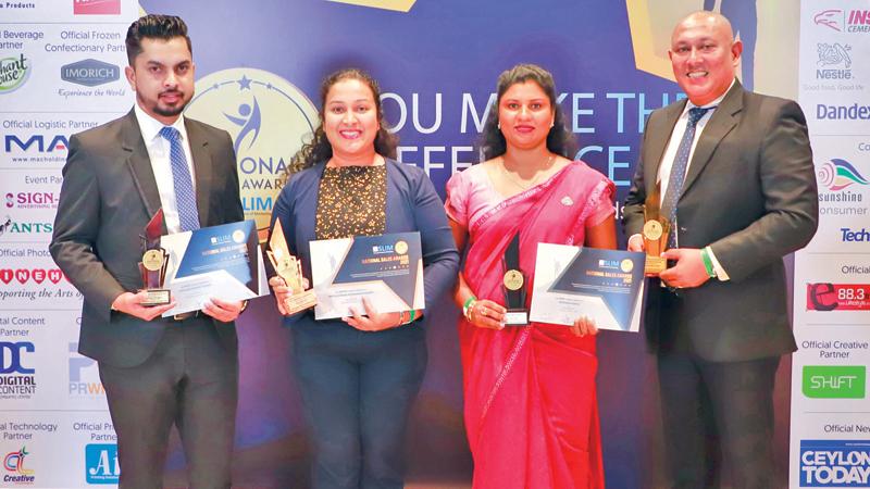 From left:  Zonal Manager, Bancassurance, Harshana Fernando, Senior Relationship Manager, Nimesha Jayasekera,   Relationship Executive Shanmugam Menaka and Assistant Vice President Bancassurance Damitha Wickramathunga with the awards