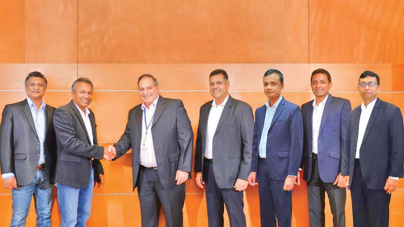 Exchange of token of appreciation at the launch of HNB online banking portal – November 2022 From left : Ideahub CXO, Dhanuka De Silva, ideahub Founder/CEO Chaminda Ranasinghe, HNB Chief Technology and Digital Officer, Rohan Buultjens, HNB GM, Retail and SME Banking, Sanjay Wijemanne; HNB AGM, Digital Business, Chammika Weerasinghe, HNB Head of Digital Services, Shankar Dharmaratne; and HNB Head of IT, PMO, Nadun Gomes