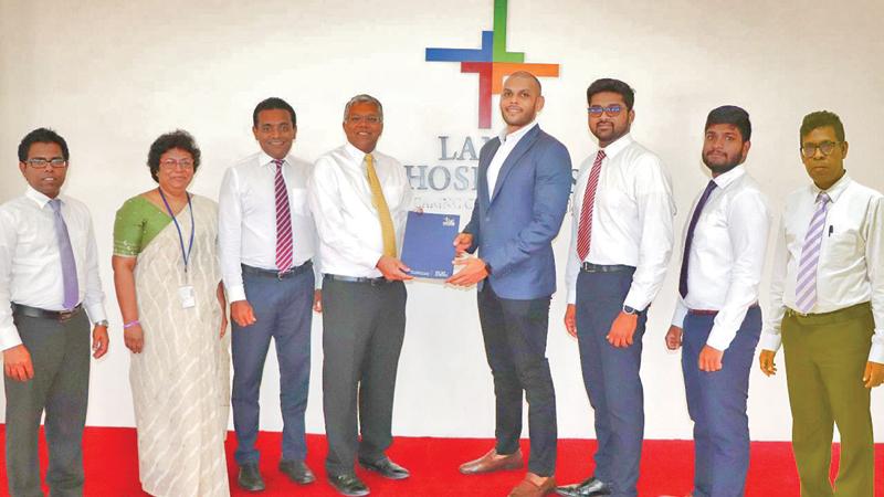 After signing the MoU. (From left): Senior Finance Business Partner, Sandun Wajira Kumara, Head of Laboratories, Dr Geethani Galagoda, Chief Marketing Officer, Nimal Ratnayake, Group CEO, Deepthi Lokuarachchi, Head of Commercial, Daraz Financial Services, Naheed Zainudeen, Merchant Success Executive, Koko, Shakthi Bhanuka, Executive, Business Development, Feroz Amjah and Group Chief Financial Officer Badrajith Siriwardana