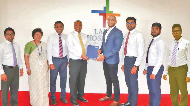 After signing the MoU. (From left): Senior Finance Business Partner, Sandun Wajira Kumara, Head of Laboratories, Dr Geethani Galagoda, Chief Marketing Officer, Nimal Ratnayake, Group CEO, Deepthi Lokuarachchi, Head of Commercial,  Daraz Financial Services, Naheed Zainudeen, Merchant Success Executive, Koko, Shakthi Bhanuka, Executive, Business Development, Feroz Amjah and Group Chief Financial Officer Badrajith Siriwardana