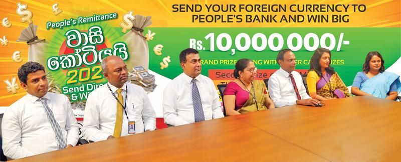 Senior DGM, Overseas Customer Services of People’s Bank, Rohan Pathirage, DGM, Channel Management, T.M.W. Chandrakumara, DGM, Recoveries, Ganga Senanayaka, AGM, OCS, Aruni Liyanagunawardana, AGM, Audit, Shantha Gangabadage, Senior Manager, OCS, Thilini Perera, Senior Manager, IT, Vipula Warnakula representing People’s Bank and Senior Tax Officer, Department of Revenue, Western Province and J.P. Gunathilake at the draw.