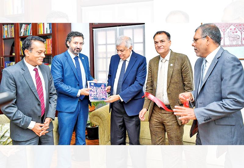 President Ranil Wickremesinghe with the team of SLRCS and IFRC leaders yesterday.