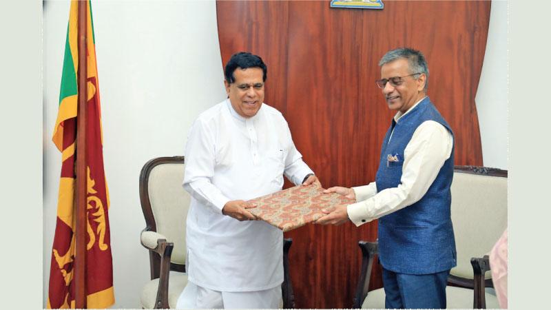 Minister Nimal Siripala de Silva with Indian HC Gopal Baglay.