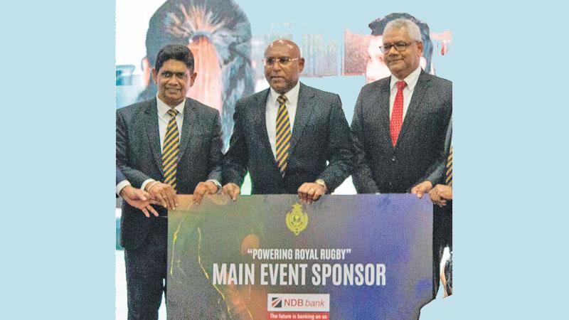 The CEO of NDB Dimantha Seneviratne (centre) handing over the sponsorship package to Deputy Principal of Royal College MVS Gunathilaka (left) in the presence of Dr. Hiran Wimalarathne (Secretary, Royal College Union)  (Pic by Ranjith Asanka) 