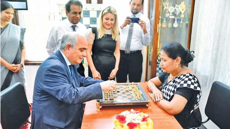 Suneetha Wijesuriya (right) plays chess with Russian ambassador Levan Dzhagaryam in the presence of the CEO of the Russian Centre Buddhapriya Ramanayake and the Director of the Russian House in Colombo who is also the First Secretary of the Russian Embassy Maria L. Popova. Sri Lanka Chess Federation President and Vice President of the Asian Chess Federation Lakshman Wijesuriya and distinguished invites were also present