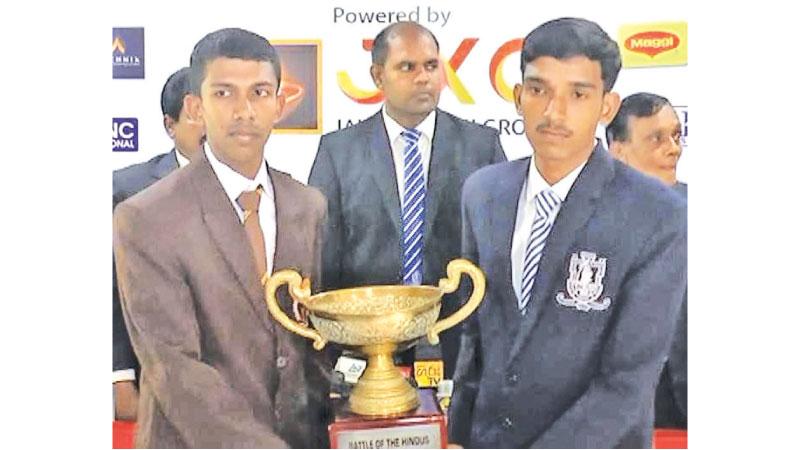 The two captains R. Dilukshan (Jaffna Hindu Colege-left) and L. Piriyandan (Colombo Hindu) with the trophy they will play for