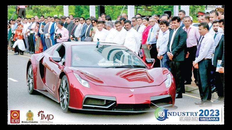 Ministers and invitees flagging off a locally assembled vehicle