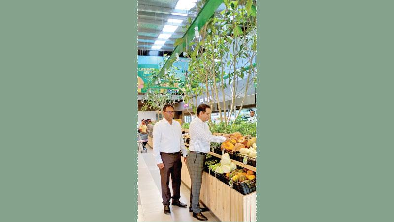 Laugfs Supermarkets CEO Pravin David and Senior Manager Marketing  Haritha Indeepaay at the branch opening