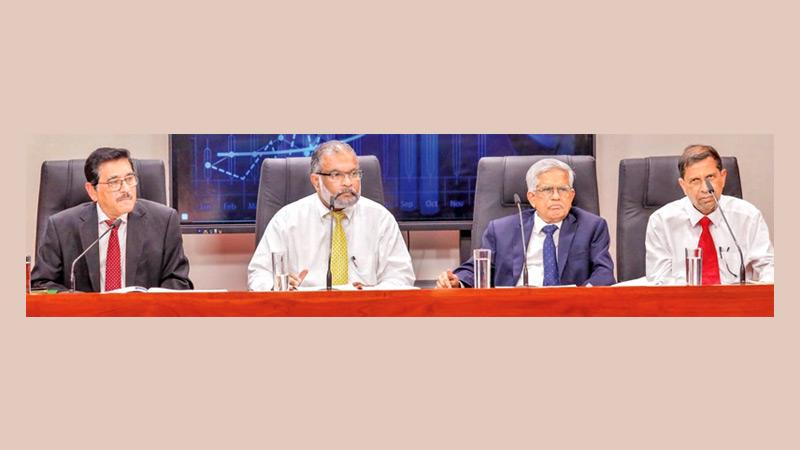 Central Bank Governor Dr. Nandalal Weerasinghe with Finance Ministry Secretary Mahinda Siriwardena, Senior Advisor to the President on Economic Affairs Dr. R. H. S. Samaratunga, and Deputy Treasury Secretary, A. K. Seneviratne at the press briefing yesterday.