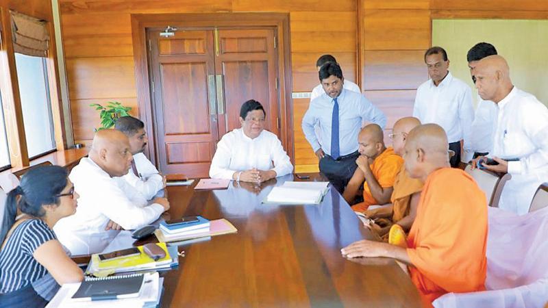 Minister Dr. Bandula Gunawardena during the discussion with the Maha Sangha.