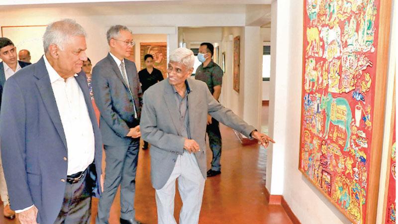 President Ranil Wickremesinghe at H. S. Sarath’s art exhibition at the Siam House. Pic: Courtesy PMD