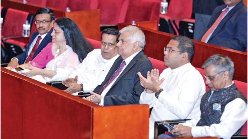 President Ranil Wickremesinghe with Indian High Commissioner Gopal Baglay, Tourism Minister Harin Fernando and Minister of Ports and Shipping Nimal Siripala de Silva at the opening of the TAAI conference.