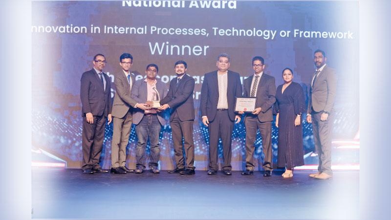 Members from Sysco LABS’ Process Team collecting the award for ‘Best Innovation in Internal Processes, Technology or Framework – All Island’. (L-R): Nishan Mendis, VicePresident – SLASSCOM, Achintha Bandara, Software Engineer – Sysco LABS, Chandana Ranasighe, CEO – Accentura (Category Sponsor), Buwaneka De Silva,Senior Associate – Process – Sysco LABS, Channa Manoharan, Past President – SLASSCOM, Pradja Dolewatte, Senior Manager – Process, Thilini Jayawardena, Associate Project Manager  and Isuru Mohottala,