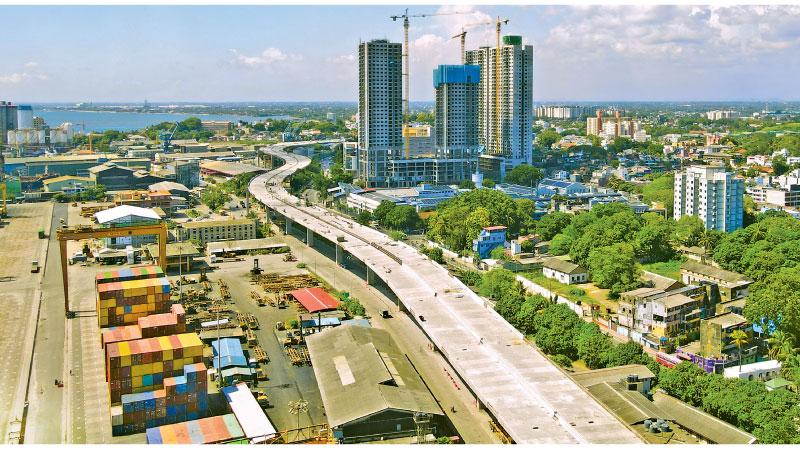 An aerial image of the elevated highway coming up next to the Colombo dockyards