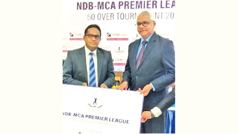 Sanjaya Perera (right) senior vice president, Personal Banking and Customer Experience handing over the sponsorship cheque to Mahesh de Alwis (MCA senior vice president)  (Pic by Wimal Karunathilaka)