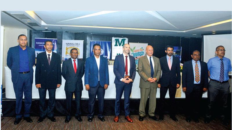 Nations Trust Bank, Tudawe Brothers, AKK Engineering, Nawaloka Constructions, Dilmah Ceylon, Maga Engineering, Ranasinha Constructions, and MAC Holdings officials at the signing ceremony.   Pic: Sudath Nishantha