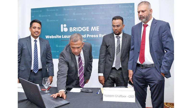 Director, BridgeMe, Basri Hameed launches the website.  Pic: Ruzaik Farook 