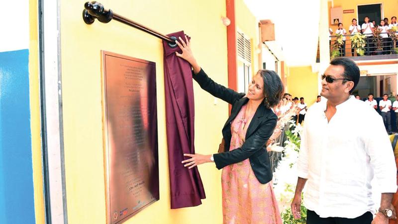 Australia’s Deputy High Commissioner to Sri Lanka Ms. Lalita Kapur unveils the plaque to mark the opening of the industrial kitchen training facility at VTA Kaduruwela, Polonnaruwa.  Chairman, VTA, Air Vice Marshal (Rtd) Prasanna Ranasinghe looks on.