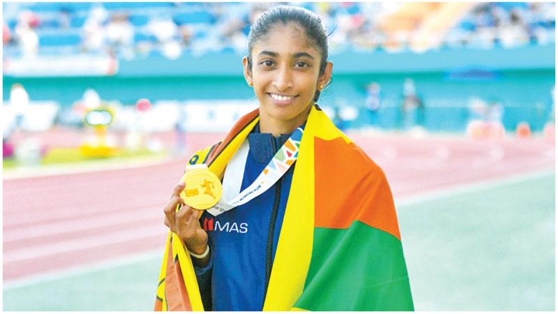 Tharushi Karunaratne with her gold medal