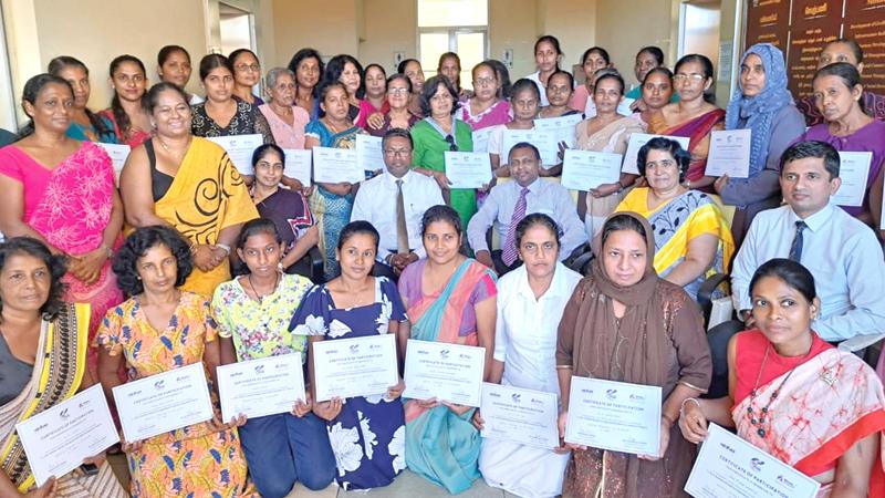 The Diva and Women in Management team with women from the 22 Divisional Secretariats in Galle