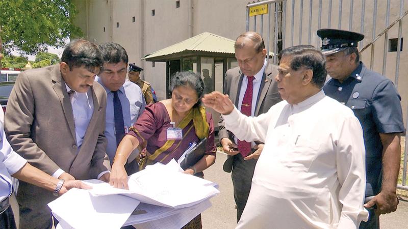 Minister Nimal Siripala de Silva with officials at the BIA.