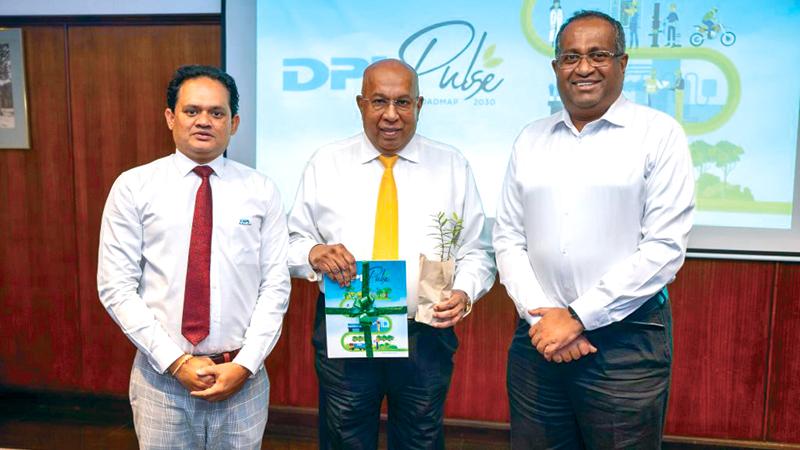 DPL Managing Director Pushpika Janadheera (left) and DPL Deputy Chairman Rajitha Kariyawasan (right) with Hayleys Group Chairman and Chief Executive Mohan Pandithage (centre) at the launch. 