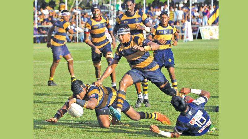 Royal College number eight Randul Senanayake crossed the line for a try in their inter school match against St. Thomas’ College at Mount Lavinia yesterday (Pic by Sulochana Gamage)