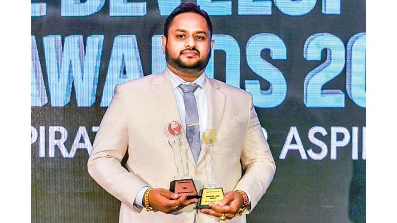 Managing Director of Island Dairies, Sampath Liyanage with the awards.