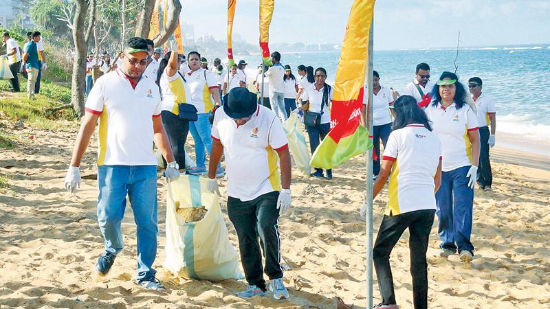 The beach clean-up in progress