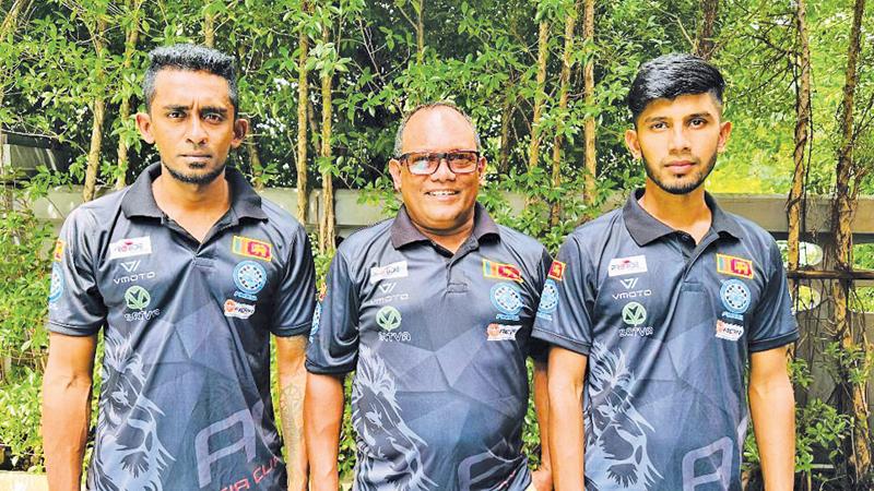 Nipuna Dilanka (left) and Sabir Mimshad (right) with manager and coach Shane Gunawardena