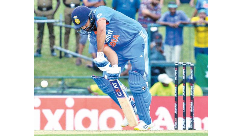 Indian batter Rohit Sharma digs out a ball before he was bowled for 11 by Pakistan paceman Shaheen Shah Afridi in the Asia Cup match in Pallekele, Kandy yesterday (Picture by Shan Rupassara)